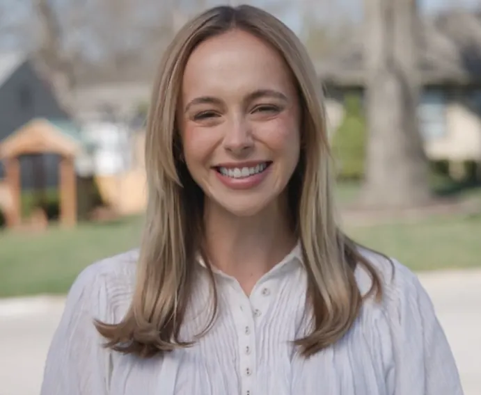 A smiling patient outdoors